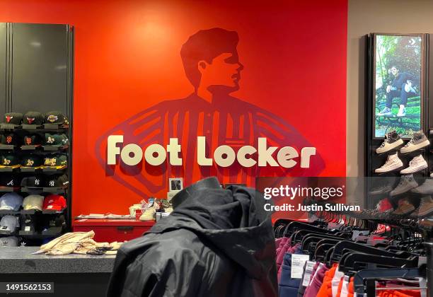 The Foot Locker logo is displayed in a store on May 19, 2023 in San Francisco, California. Foot Locker saw a nearly 28% drop in their stock value...