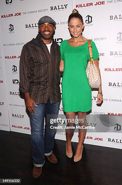 Tiki Barber and Traci Lynn Johnson attend The Cinema Society with Bally & DeLeon screening of LD Entertainment's "Killer Joe" at Tribeca Grand Hotel...