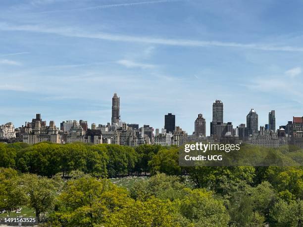 View of New York Skyline across Central Park looking towards the Upper Eat Side and Sheeps Meadow, Manhattan.