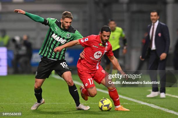 Domenico Berardi of US Sassuolo battles for possession with Gianluca Caprari of AC Monza during the Serie A match between US Sassuolo and AC Monza at...