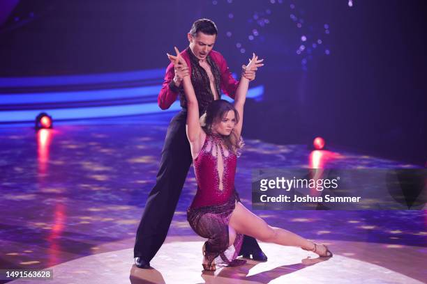 Julia Beautx and Zsolt Sándor Cseke are seen on stage during the finals of the 16th season of the television competition show "Let's Dance" at MMC...