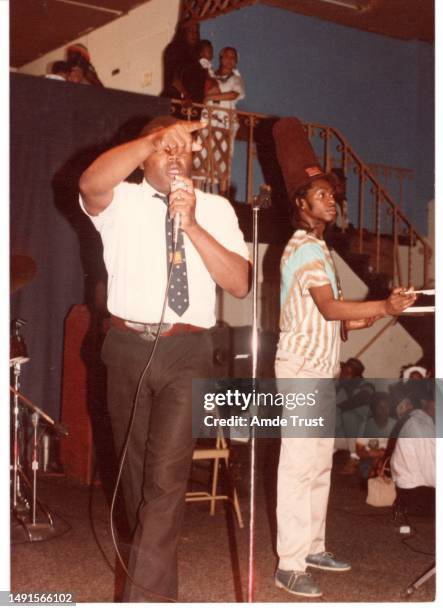 Rhythm guitarist and lead singer David Hinds of Steel Pulse right and Lee Howard left member of the St. Teckle Haymonot Ethiopian Orthodox Church,...