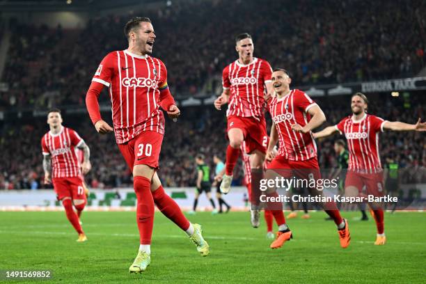 Christian Gunter of SC Freiburg celebrates scoring his teams first goal of the game during the Bundesliga match between Sport-Club Freiburg and VfL...