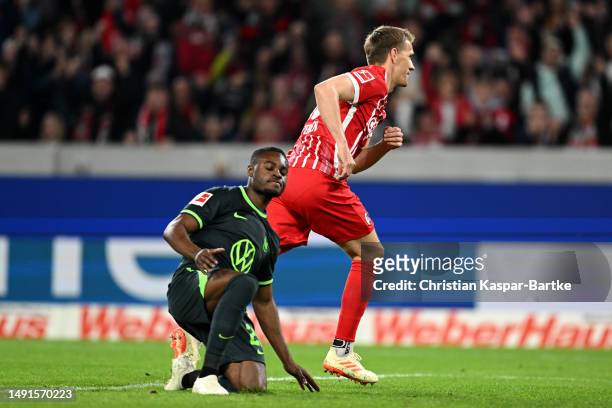 Nils Petersen of SC Freiburg celebrates scoring his teams second goal of the game during the Bundesliga match between Sport-Club Freiburg and VfL...