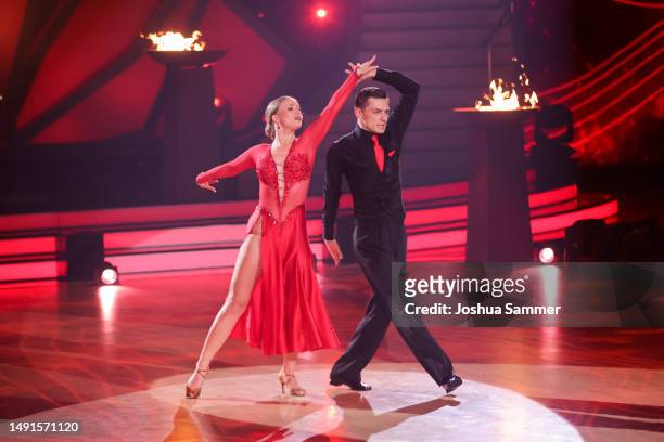 Julia Beautx and Zsolt Sándor Cseke are seen on stage during the finals of the 16th season of the television competition show "Let's Dance" at MMC...