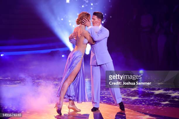 Anna Ermakova and Valentin Lusin perform on stage during the finals of the 16th season of the television competition show "Let's Dance" at MMC...