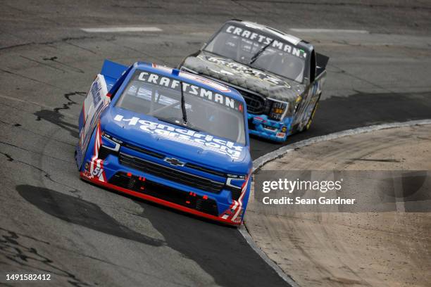 Ryan Newman, driver of the Biohaven/Jacob Co. Ford, and Josh Williams, driver of the Katz Coffee/Alloy Ford, drives during practice for the NASCAR...