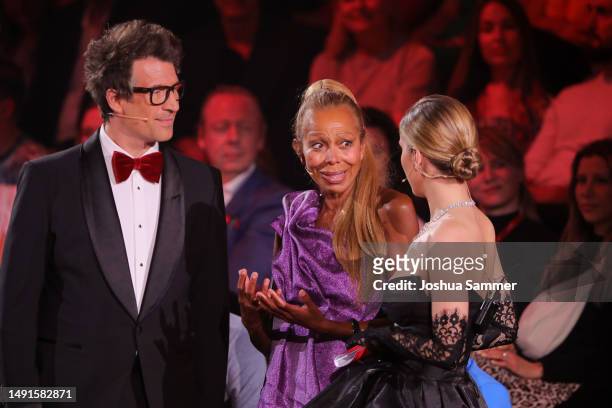 Angela Ermakova is interviewd by the hosts Daniel Hartwich and Victoria Swarovski during the finals of the 16th season of the television competition...