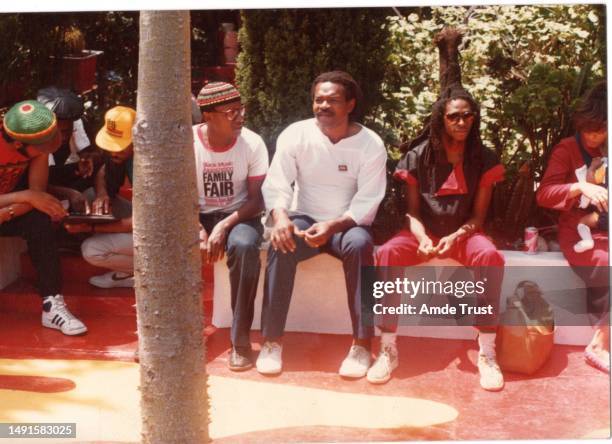 Rhythm guitarist and lead singer David Hinds with English roots reggae band Steel Pulse sitting next to St. Teckle Haymonot Ethiopian Orthodox Church...