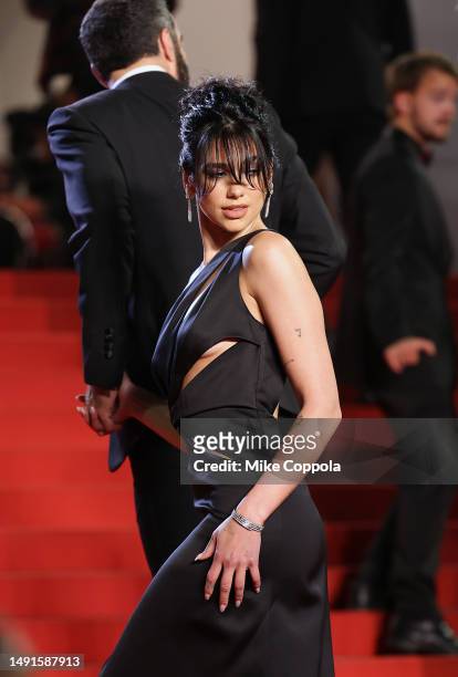 Dua Lipa attends the "Omar La Fraise " red carpet during the 76th annual Cannes film festival at Palais des Festivals on May 19, 2023 in Cannes,...