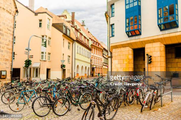 bicycles on the street in bamberg. bavaria. - munich residenz stock pictures, royalty-free photos & images