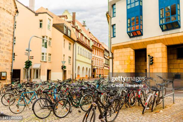 bicycles on the street in bamberg. bavaria. - residenz bildbanksfoton och bilder