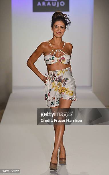 Model walks the runway at the A.Z Araujo show during Mercedes-Benz Fashion Week Swim 2013 Official Coverage at The Raleigh on July 23, 2012 in Miami...