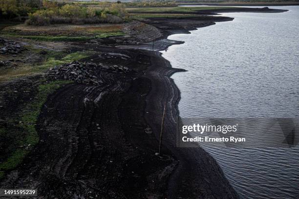 View shows the low level of water at Paso Severino Dam on May 17, 2023 in Florida, Uruguay. Paso Severino is considered the main fresh water...