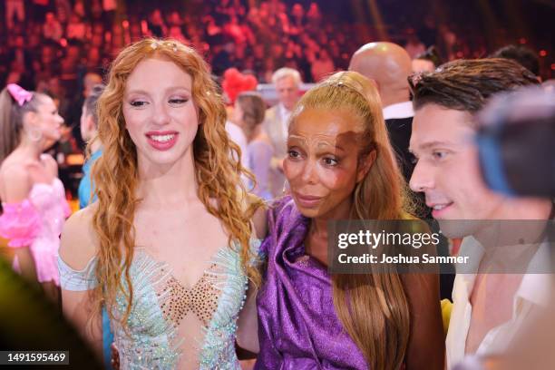 Anna Ermakova, Angela Ermakova and Valentin Lusin are interviewed at the stage after the finals of the 16th season of the television competition show...