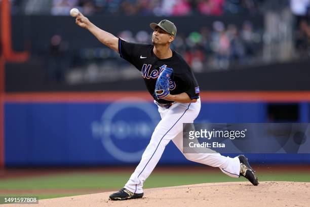 Carlos Carrasco of the New York Mets delivers a pitch in the first inning against the Cleveland Guardians at Citi Field on May 19, 2023 in the...