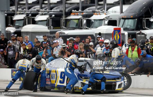 Chase Elliott, driver of the NAPA Auto Parts Chevrolet, pits during the NASCAR Cup Series All-Star Race Qualifying Pit Crew Challenge at North...