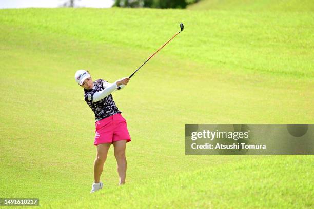 Ritsuko Ryu of Japan hits her second shot on the 16th hole during the rest of second round of Bridgestone Ladies Open at Chukyo Golf Club Ishino...