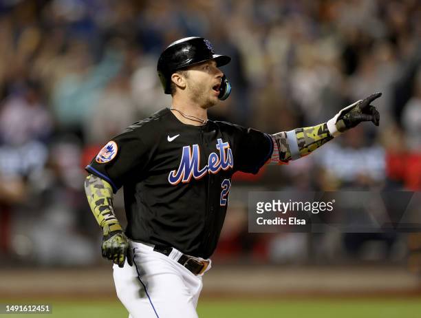 Pete Alonso of the New York Mets celebrates his grand slam in the seventh inning against the Cleveland Guardians at Citi Field on May 19, 2023 in the...