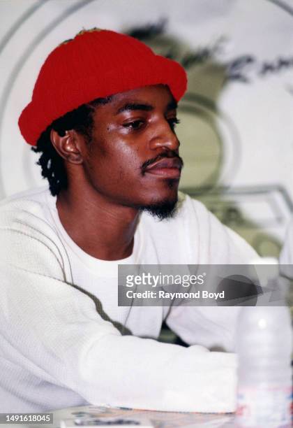 Rapper André 3000 of Outkast signs autographs and greets fans at George's Music Room in Chicago, Illinois in October 1998.