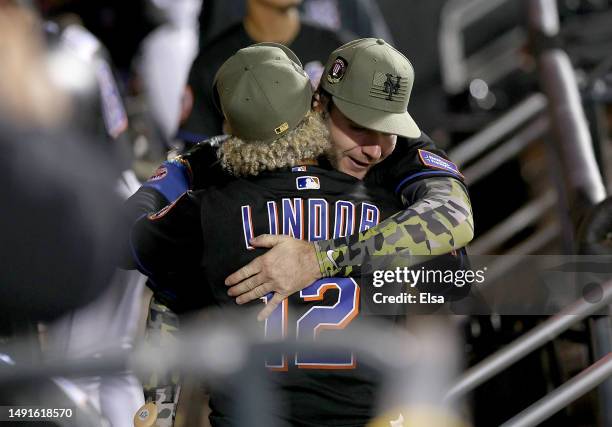 Pete Alonso and Francisco Lindor of the New York Mets celebrate the win over the Cleveland Guardians at Citi Field on May 19, 2023 in the Flushing...