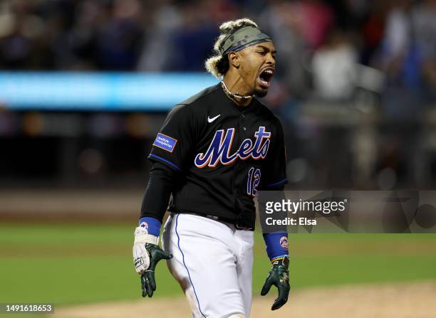 Francisco Lindor of the New York Mets celebrates after he drove in the game winning run in the 10th inning against the Cleveland Guardians at Citi...
