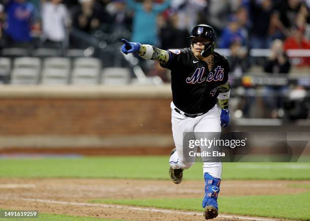 Francisco Alvarez of the New York Mets celebrates his single in the 10th inning against the Cleveland Guardians at Citi Field on May 19, 2023 in the...