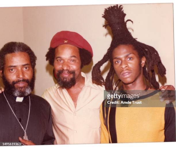 Rhythm guitarist and lead singer David Hinds of the English roots reggae band Steel Pulse Pulse right, Fr. Amde Hamilton left, and David Mosley...