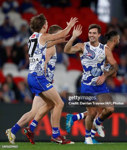 Jy Simpkin of the Kangaroos celebrates a goal during the round 10 AFL match between North Melbourne Kangaroos and Sydney Swans at Marvel Stadium, on...