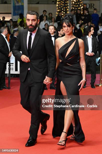 Dua Lipa and Romain Gavras attend the "Omar La Fraise " red carpet during the 76th annual Cannes film festival at Palais des Festivals on May 19,...