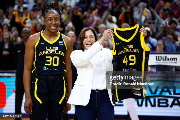 Vice President Kamala Harris and forward Nneka Ogwumike of the Los Angeles Sparks before a game between the Phoenix Mercury and the Los Angeles...