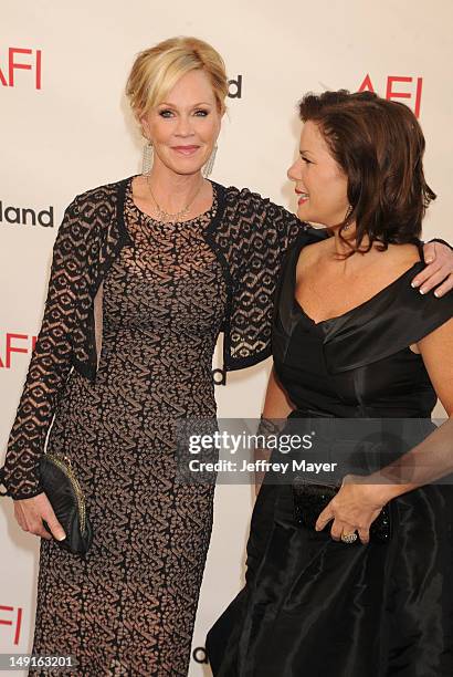 Melanie Griffith and Marcia Gay Harden arrive at the 40th AFI Life Achievement Award honoring Shirley MacLaine at Sony Pictures Studios on June 7,...