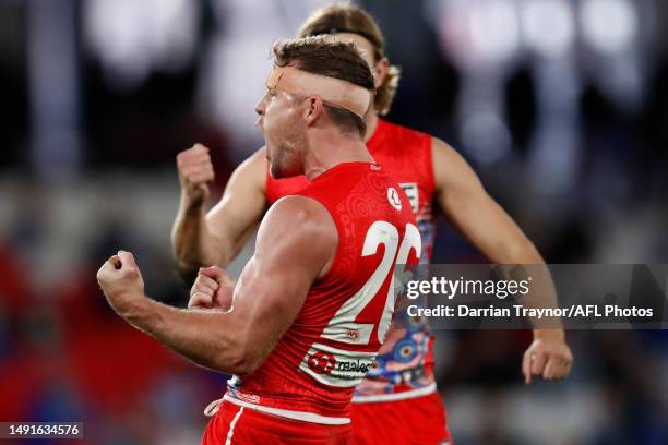 Luke Parker of the Swans celebrates a goal during the round 10 AFL match between North Melbourne Kangaroos and Sydney Swans at Marvel Stadium, on May...