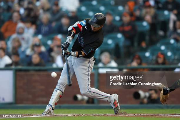 Luis Arraez of the Miami Marlins hits a single in the top of the first inning against the San Francisco Giants at Oracle Park on May 19, 2023 in San...