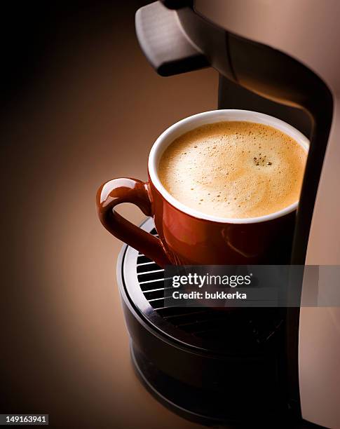 close-up of an espresso coffeemaker - koffiemachine stockfoto's en -beelden