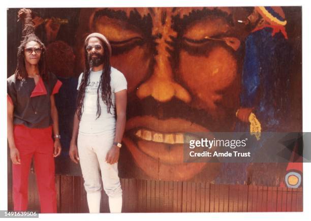 Rhythm guitarist and lead singer David Hinds of the English roots reggae band Steel Pulse left and Tony G fan right at the St. Teckle Haymonot...