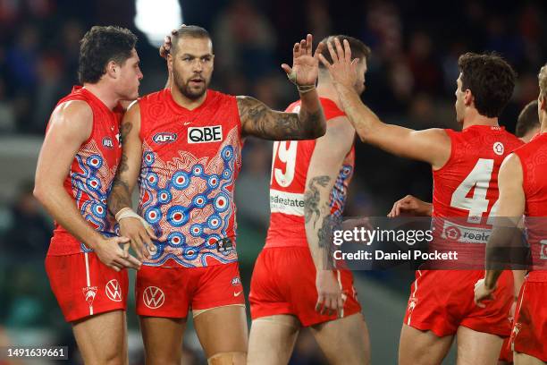 Lance Franklin of the Swans celebrates kicking a goal during the round 10 AFL match between North Melbourne Kangaroos and Sydney Swans at Marvel...