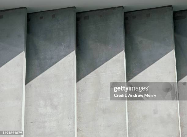 concrete building window facade sunlight - luogo non identificato foto e immagini stock