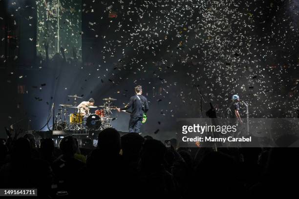 Travis Barker, Mark Hoppus and Tom DeLonge of Blink-182 perform onstage at Madison Square Garden on May 19, 2023 in New York City.