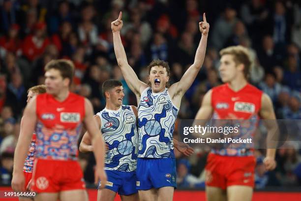 Nick Larkey of the Kangaroos celebrates kicking a goal during the round 10 AFL match between North Melbourne Kangaroos and Sydney Swans at Marvel...
