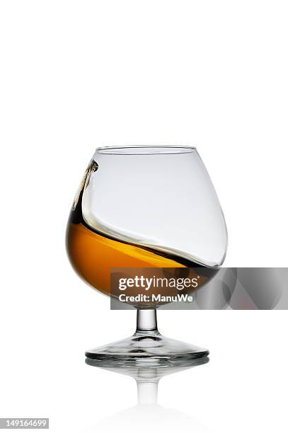 glass of cognac - cognac stockfoto's en -beelden