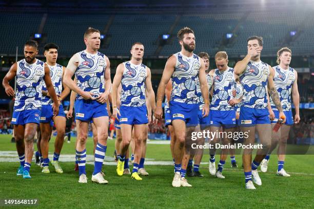 The Kangaroos looks dejected after the round 10 AFL match between North Melbourne Kangaroos and Sydney Swans at Marvel Stadium, on May 20 in...