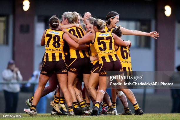 Box Hill Hawks team mates congratulate Gabby Collingwood of the Box Hill Hawks after kicking the winning goal during the round nine VFLW match...