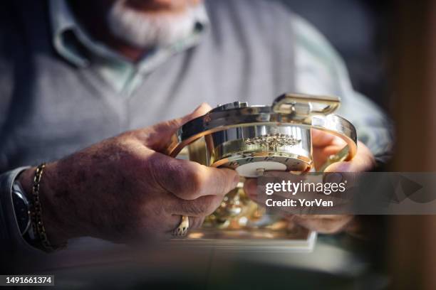 Man Fixing Clock 91 Old Man Fixing Clock Stock Photos, High-Res Pictures, and Images ...