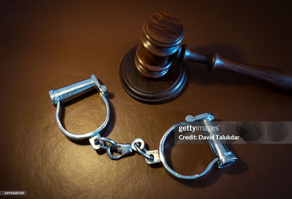 Gavel and handcuffs
