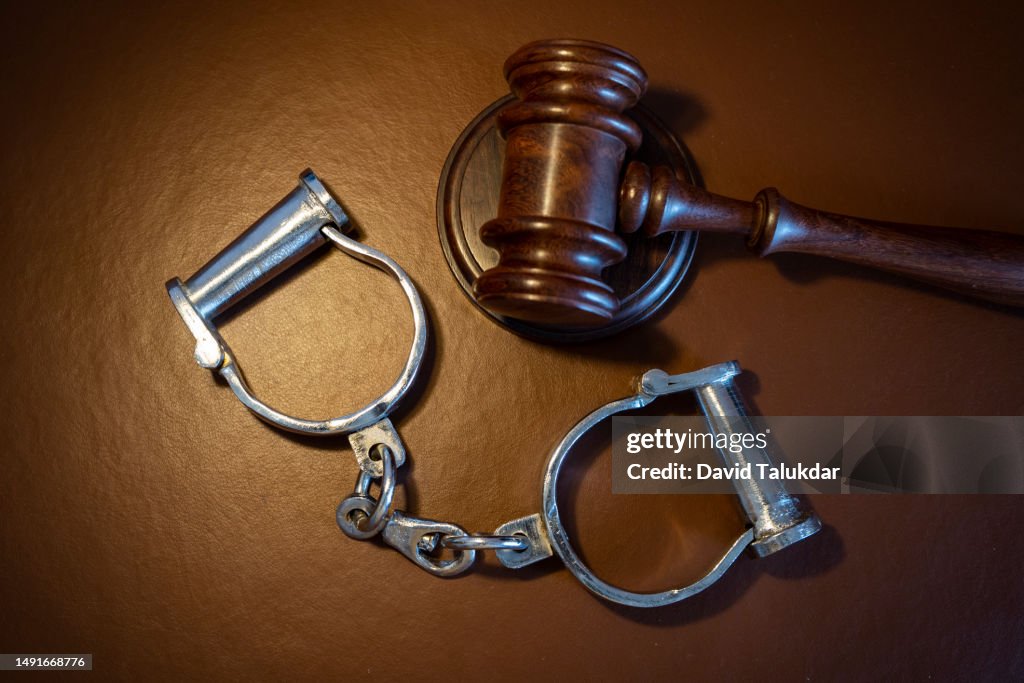 Gavel and handcuffs