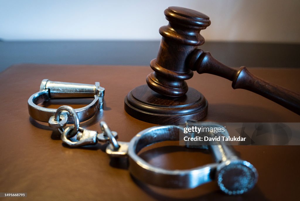Gavel and handcuffs
