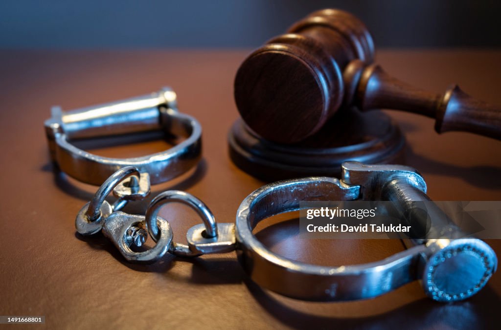 Gavel and handcuffs