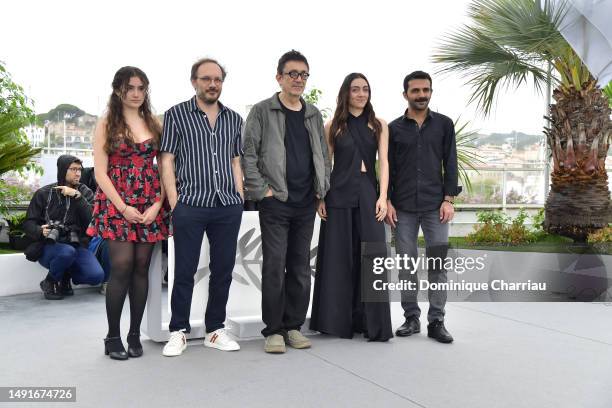 Ece Bagci, Deniz Celiloglu, Director Nuri Bilge Ceylan, Merve Dizdar and Musab Ekici attend the "Kuru Otlar Ustune " photocall at the 76th annual...