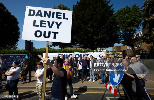 Fans are seen outside the stadium holding a sign reading "Daniel Levy Out" prior to the Premier League match between Tottenham Hotspur and Brentford...